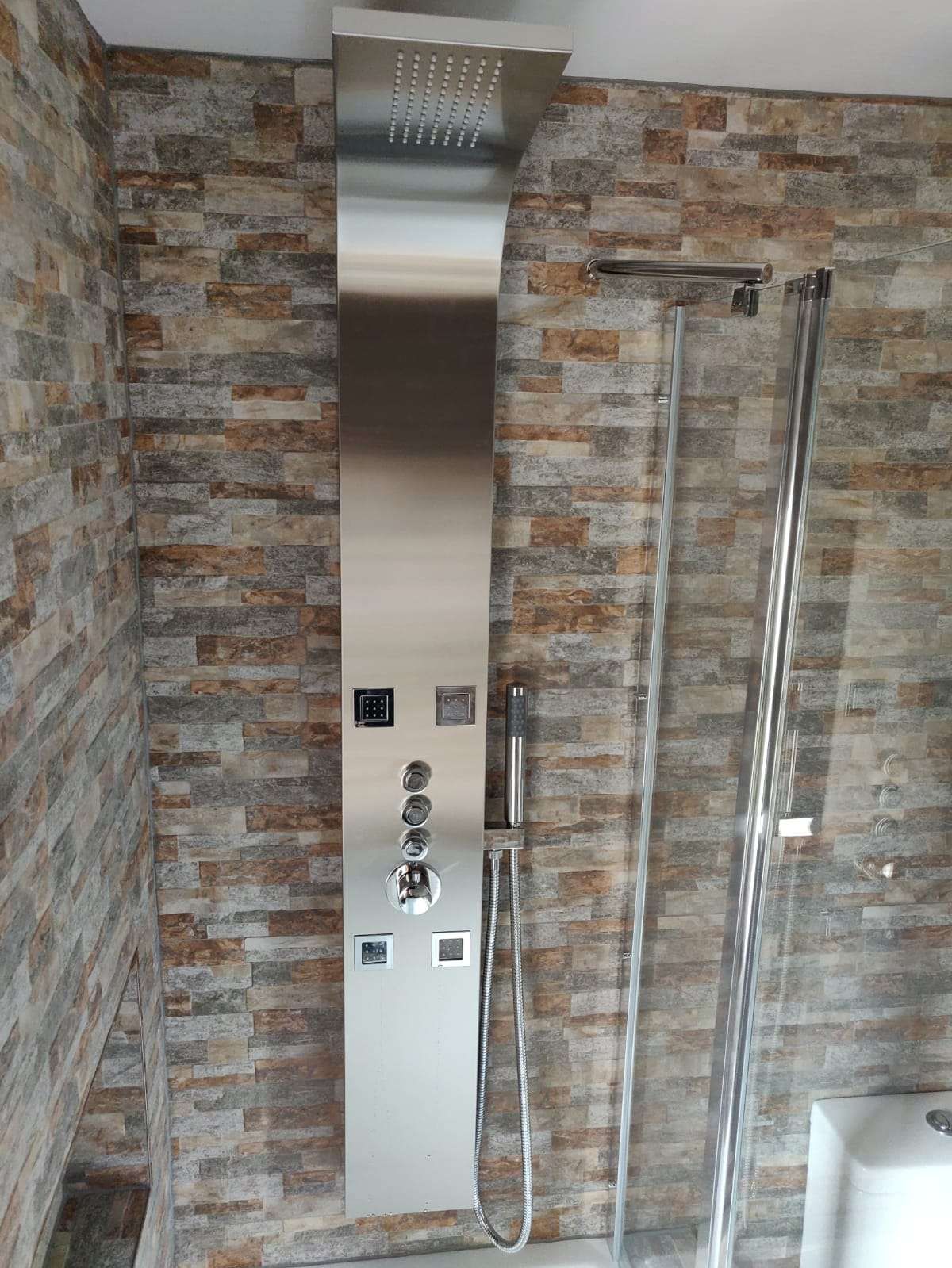 Wetroom shower with brick-effect tiling