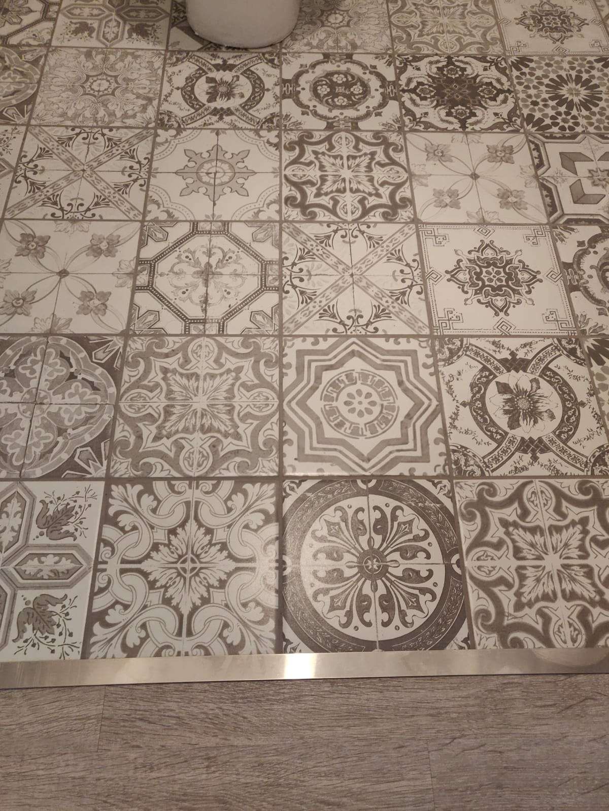 Close-up of decorative patterned wall tiling